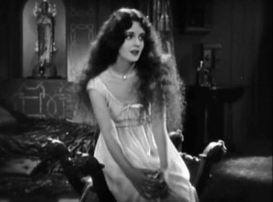 DJ's conquest enjoying a pensive moment. Film still from  'Don Juan', 1926